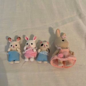 Set of abandoned Calico Critter babies and one teen